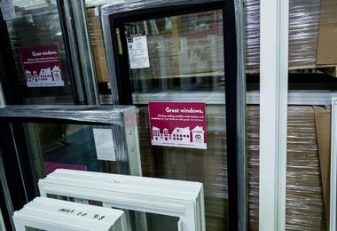 DraftLOCK and standard windows displayed side by side in a showroom