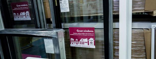 DraftLOCK and standard windows displayed side by side in a showroom