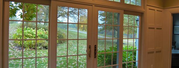 French patio doors in a Canadian home opening to an outdoor space with natural light