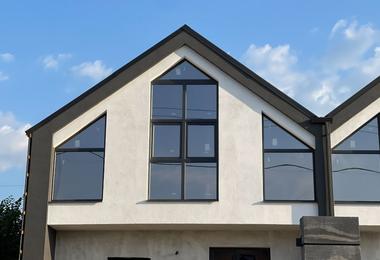 Newly built penthouse living space with high-ceiling windows