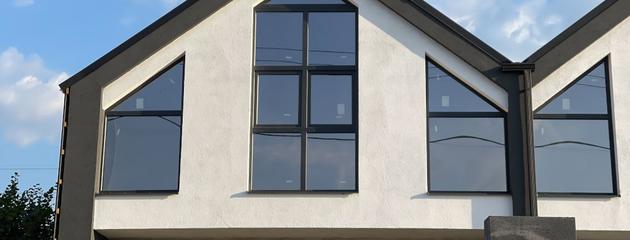 Newly built penthouse living space with high-ceiling windows