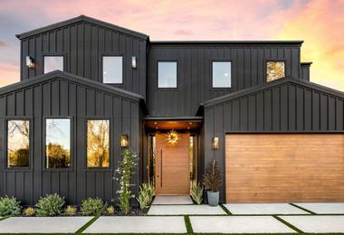 Contemporary Canadian home exterior with a modern front entry door, illustrating long-term durability and curb appeal.
