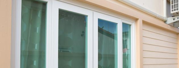 Impact-resistant window with blinds in a modern Canadian home interior