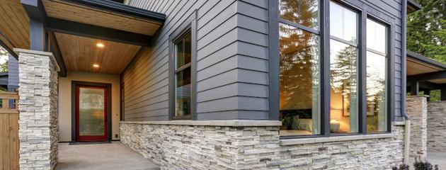 Modern residential home with large tilt and turn windows and clean architectural lines