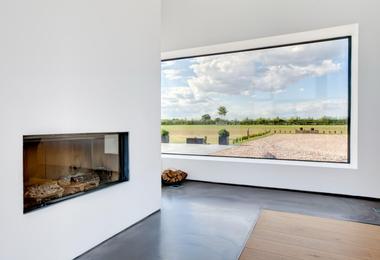 Large picture window in a modern Canadian home providing natural light and unobstructed outdoor views