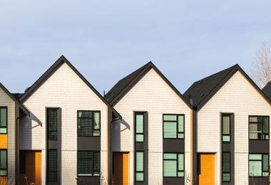 Modern residential buildings in Vancouver, where homeowners often replace aging windows.