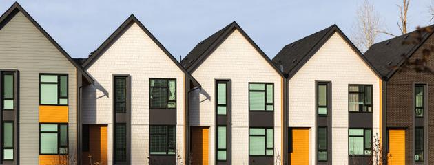 Modern residential buildings in Vancouver, where homeowners often replace aging windows.