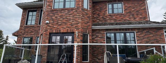 Triple-pane windows installed on a residential home in Calgary, designed to improve comfort during wind and temperature swings