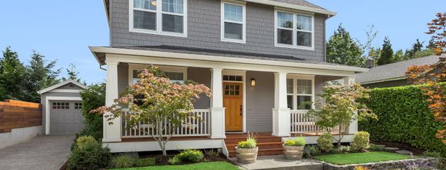 Craftsman-style home in Whitby with large windows designed to withstand wind load and protect against harsh weather conditions