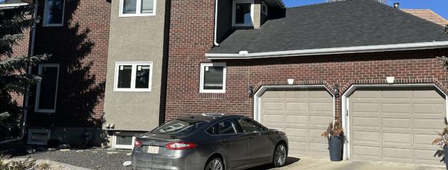 Window replacement in a Calgary home with energy-efficient windows installed for a cold climate