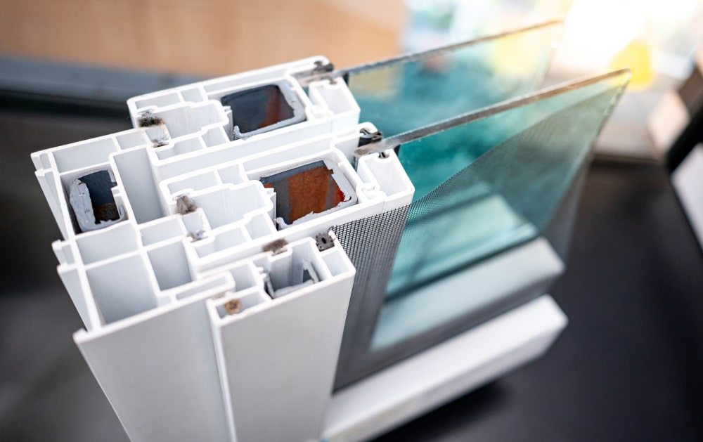 Cutaway of insulated glass unit in PVC frame with Low-E coating and argon gas fill for energy efficiency