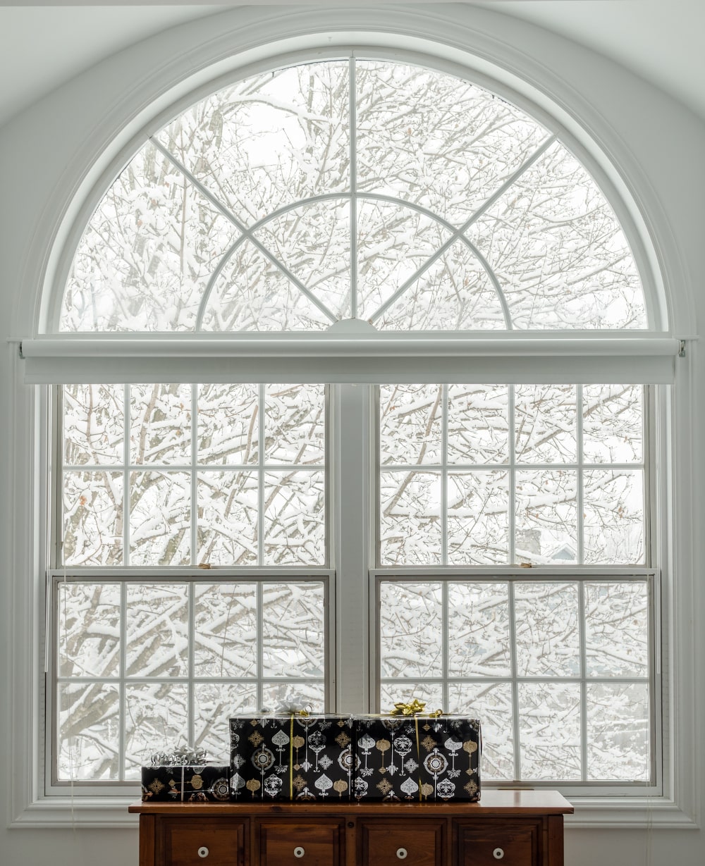 White transom window above door bringing natural light