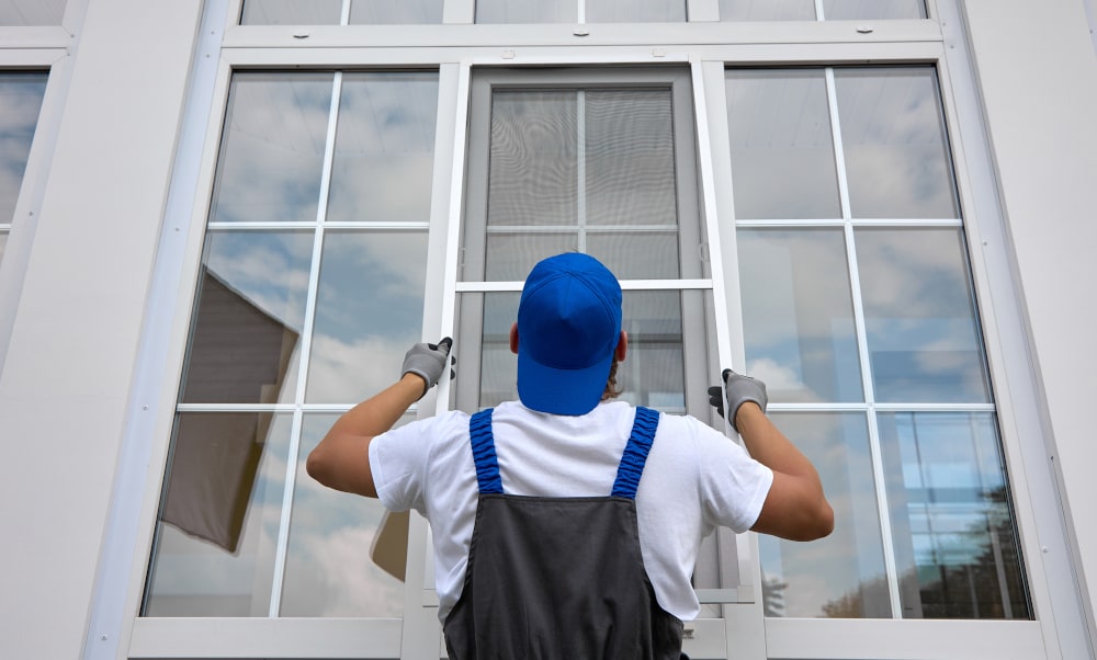 Professional installation of vinyl windows in a modern home