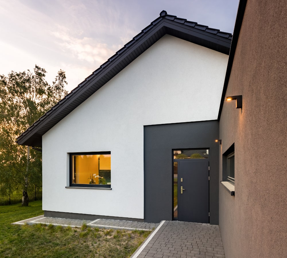 Canadian home with black-framed windows, showcasing a modern aesthetic