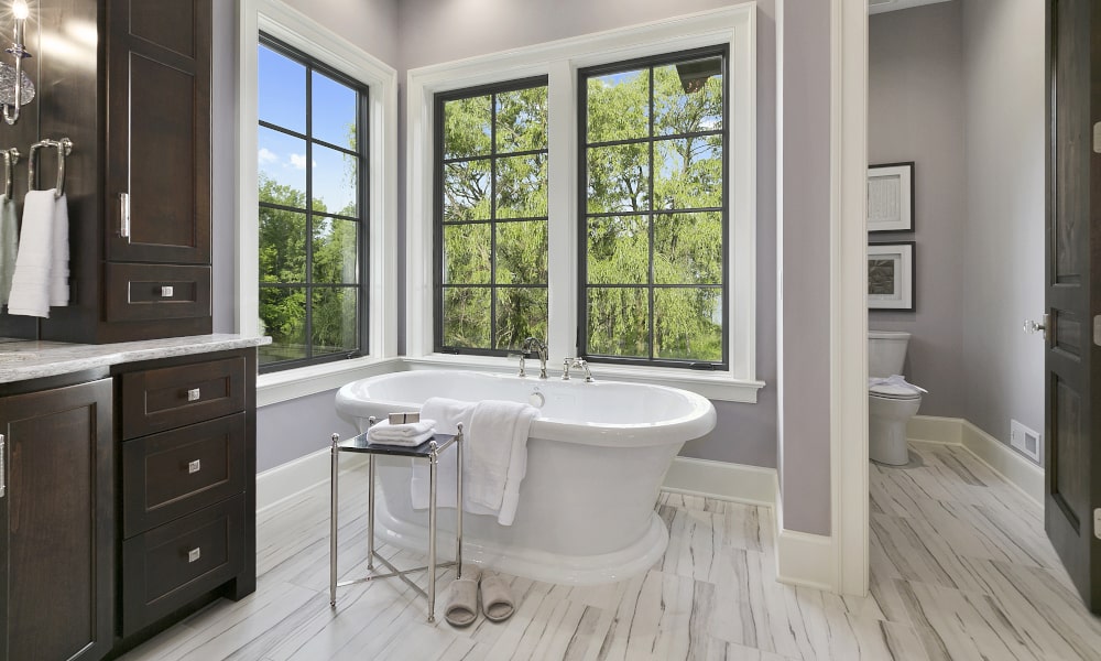 Custom bathroom window featuring privacy glass and frame colour matched to the interior design