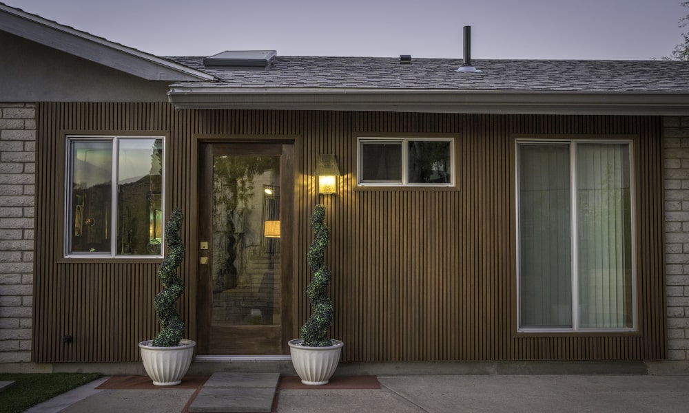 Fibreglass front door with sidelights showing a smooth finish and high insulation performance