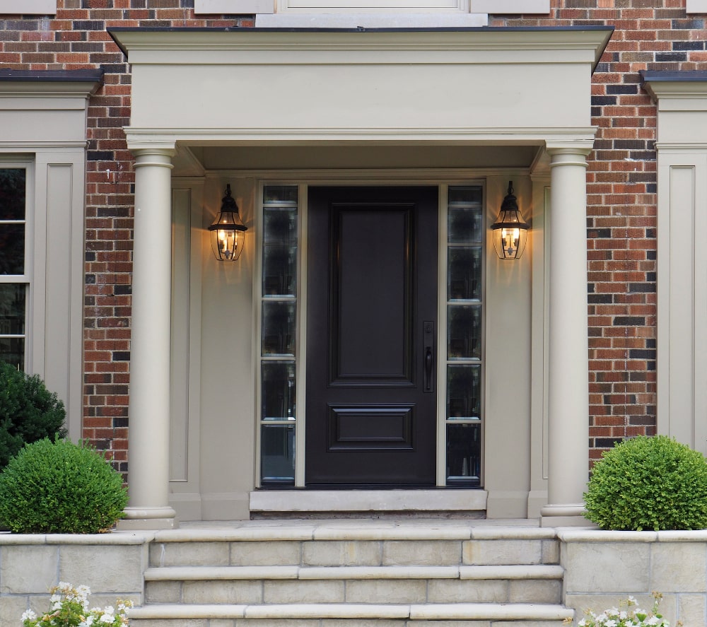 Fibreglass front door with wood-grain texture and modern panel design featured in 2026 Canadian home trends