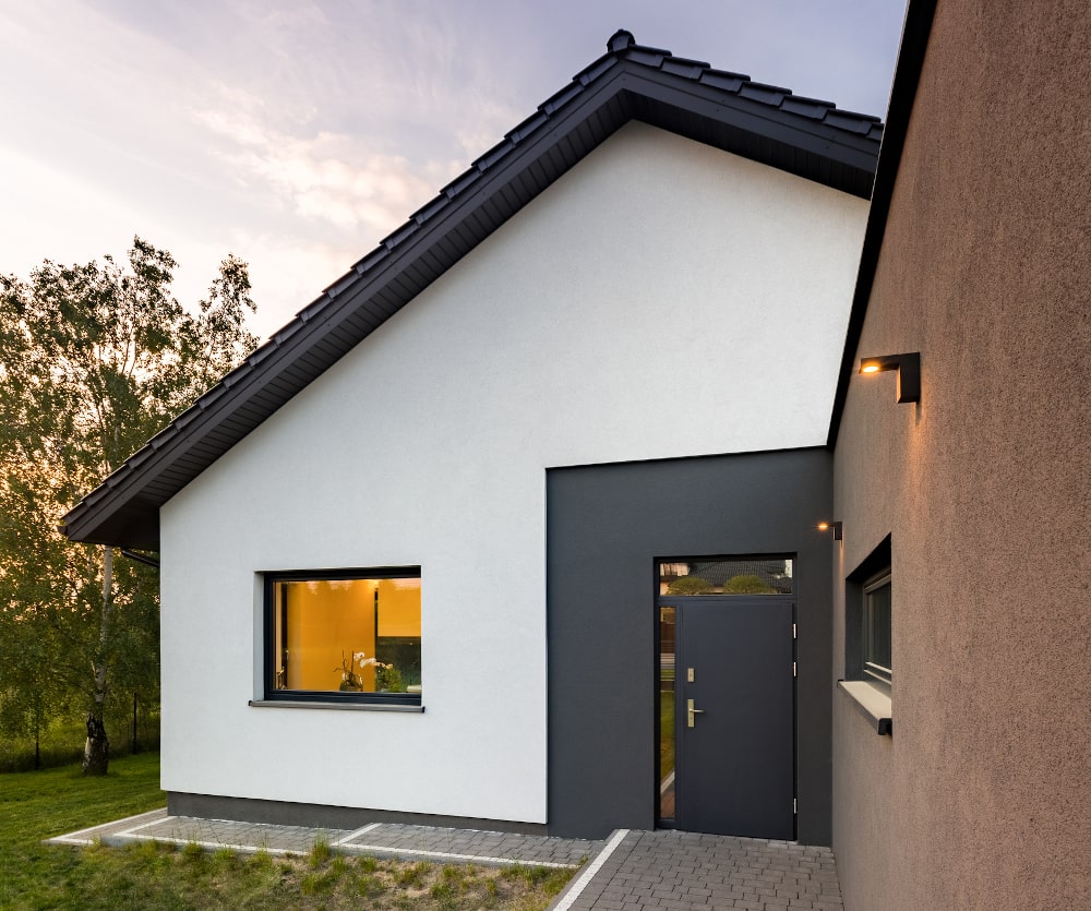 Steel front door on a modern Canadian home, showing durability and clean design trends for 2026