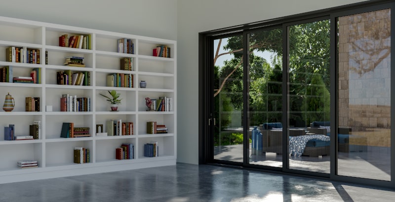 Oversized multi-panel sliding patio doors for seamless indoor-outdoor living Large modern living room with 4-panel sliding patio doors offering panoramic outdoor view