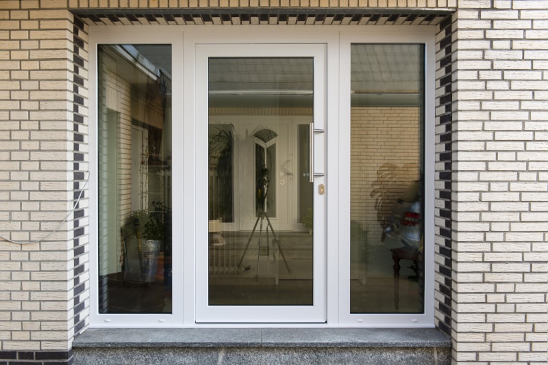 Traditional wooden framed screen door on a heritage-style home