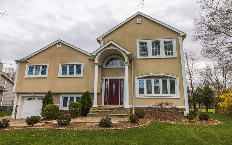 Modern home view representing improved comfort, reduced drafts, and better noise insulation from high-performance window systems in Canada.