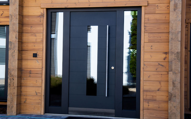Modern front entry door illustrating typical steel door durability, energy performance, and maintenance needs in Canadian climates.