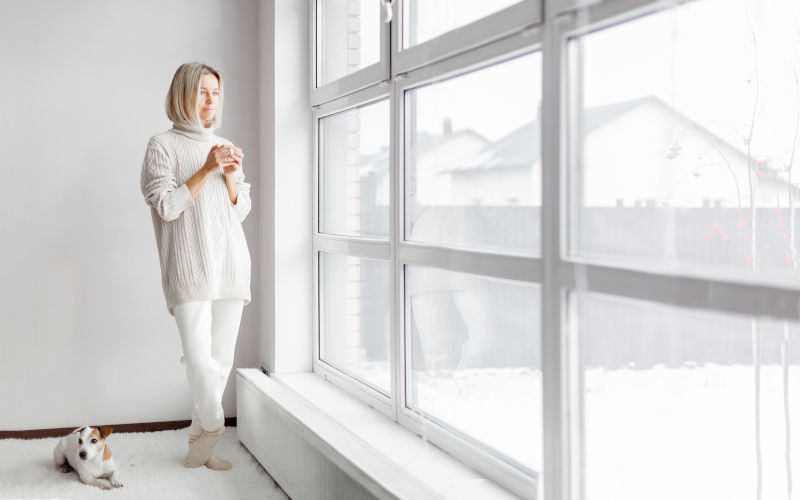 Bright and clean room with clear windows in a Canadian home after preventing black mould and improving window moisture control.
