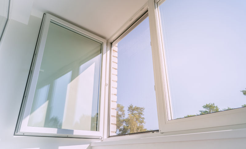 Open vinyl window in a bright modern interior, illustrating quality materials from reliable window suppliers