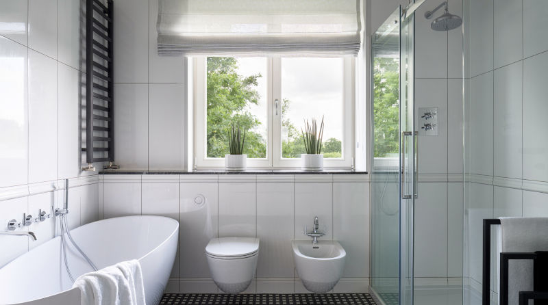 Bathroom with shower window demonstrating proper layout and waterproofing considerations