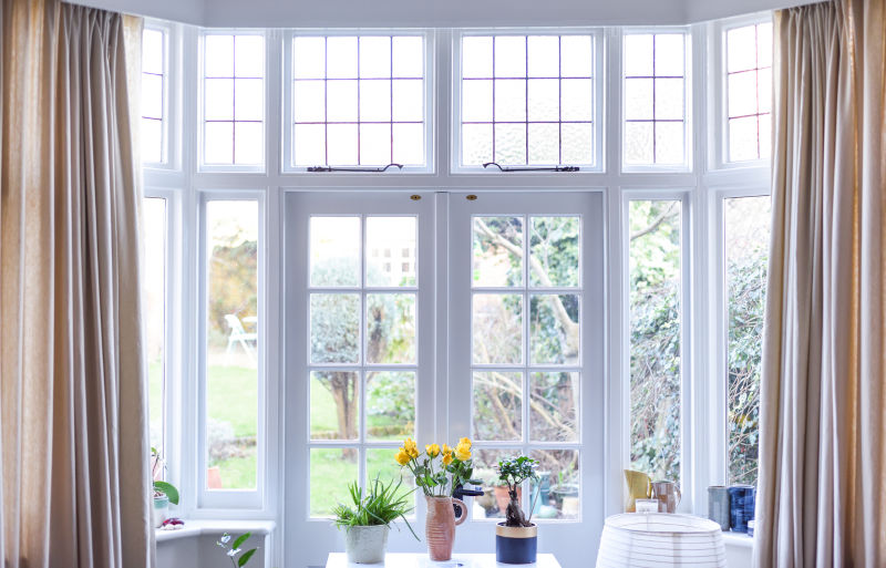 Interior room with French doors allowing natural light and access to patio