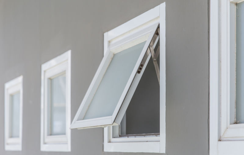 Awning window with compression seal designed to reduce outside noise