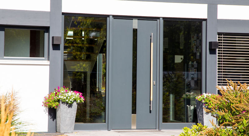 Contemporary anthracite grey front door showcasing modern design and security features