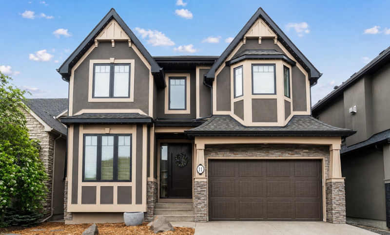 Draftlock Plus, triple pane, black exterior, cottage-style grills (top row, internal)